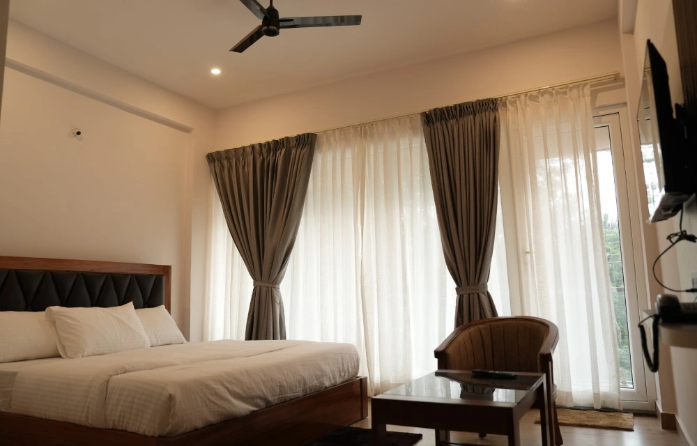 Pallakki Comforts Deluxe Room Image